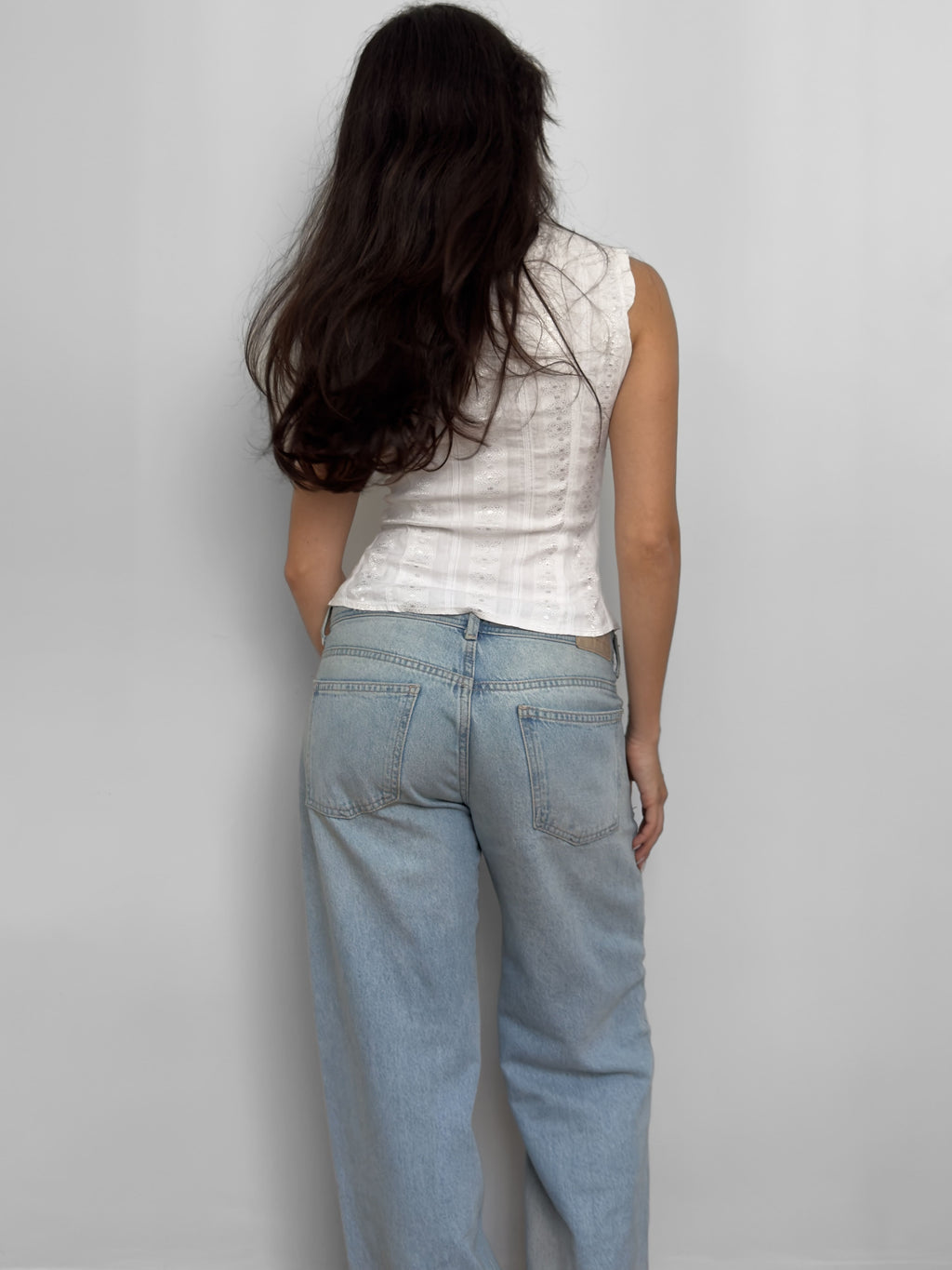 Sleeveless White Shirt