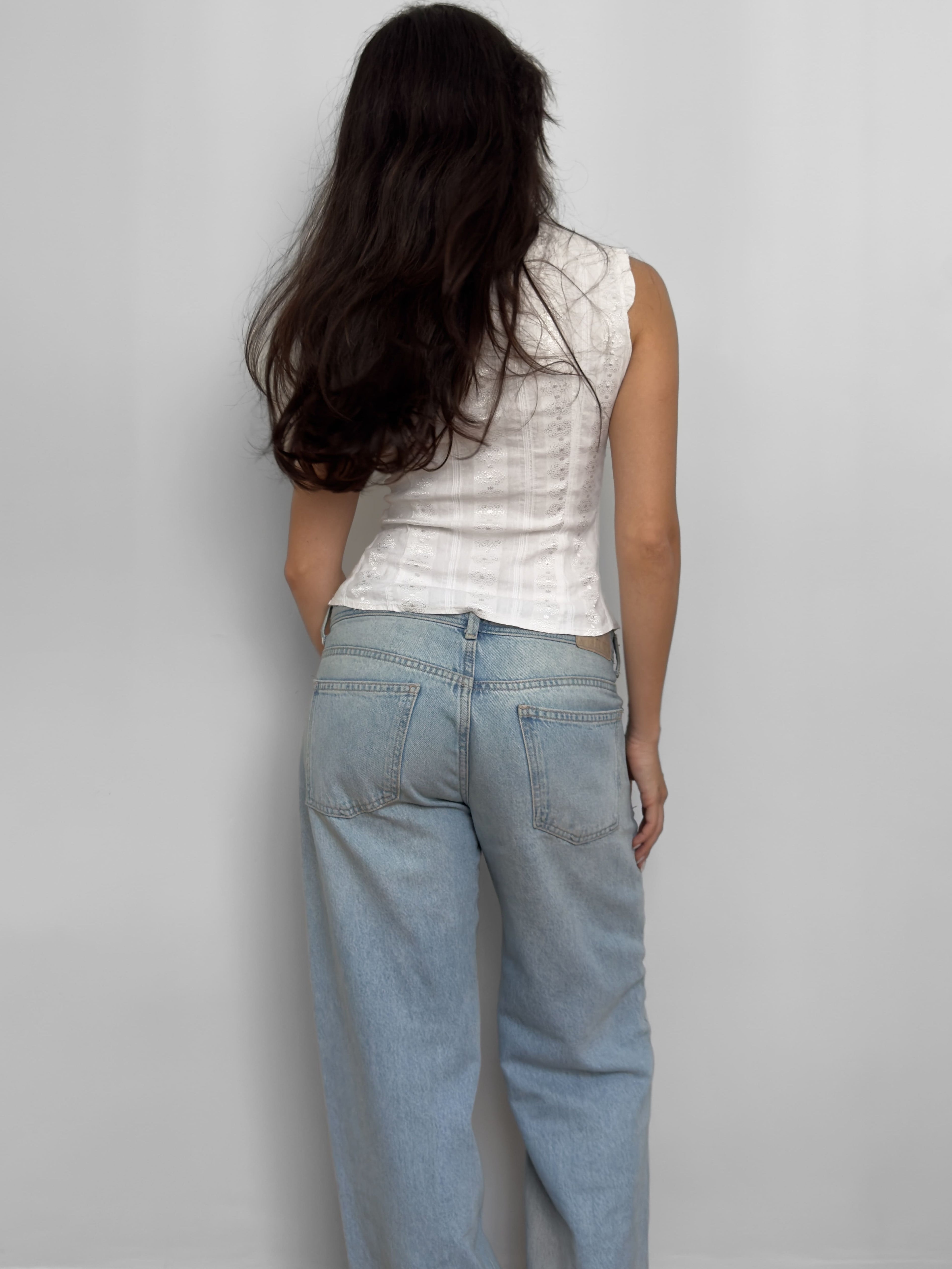 Sleeveless White Shirt