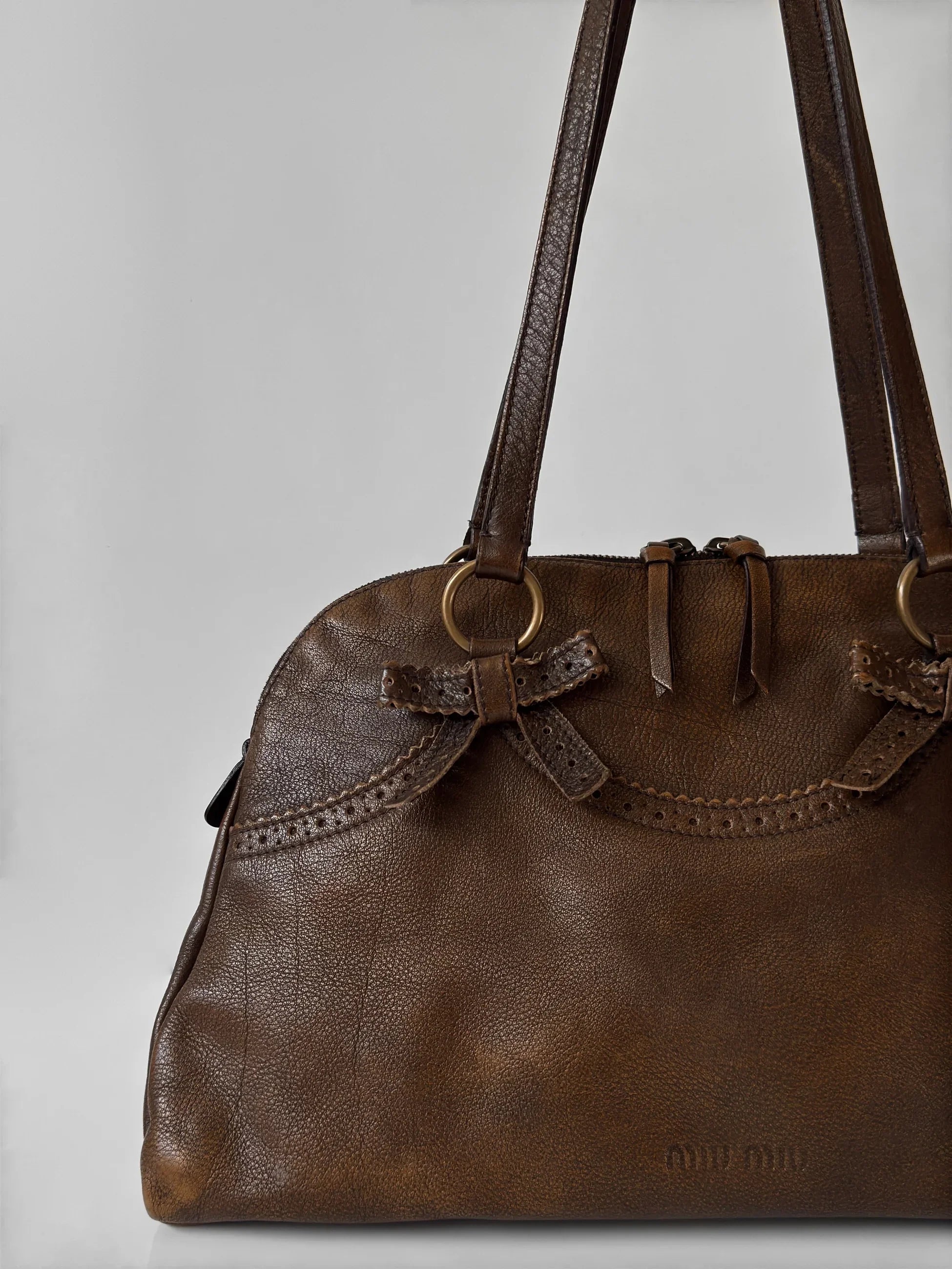 Miu Miu Bow-Detailed Distressed Leather Bag